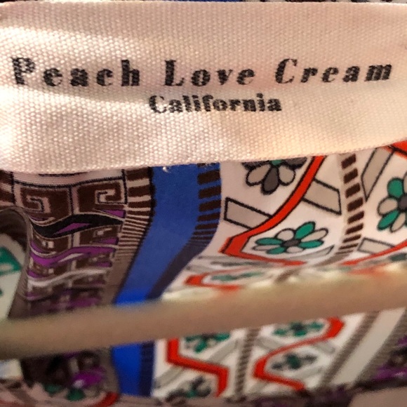 Small Tribal Print Dress with Multicolored designs and short sleeves - Picture 6 of 7